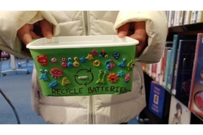 Decorated box to hold used batteries