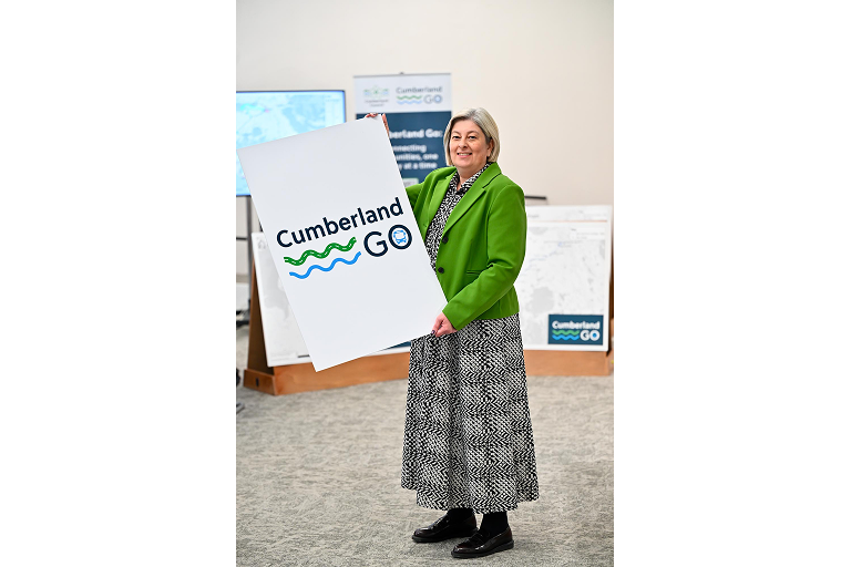 Cllr Denise Rollo holding up Cumberland Go sign