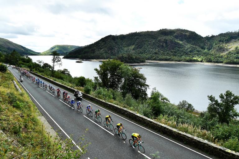 Cyclists next to lake