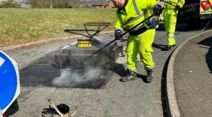 Workmen fixing roads