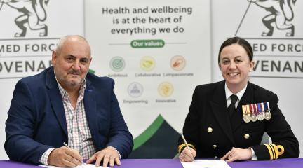 Cllr Mark Fryer signing the Armed Forces Covenant