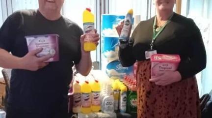 Anne Crook and Geoff Brown with cleaning products