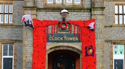 The Clock Tower door decorated with poppies