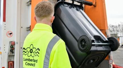 Man emptying bin