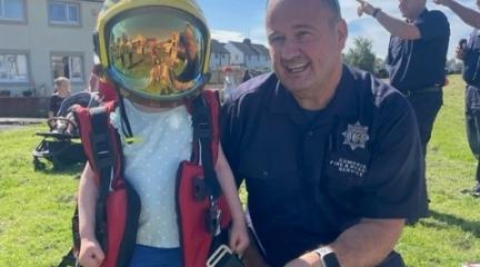 Fireman and child at Operation Respect Westfield 2023