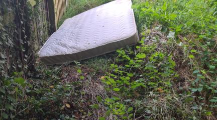 Mattress fly-tipped on Eastern Way in Carlisle