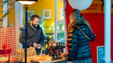 cockermouth businesses like fermento in market place spilled out on the streets to join the fun