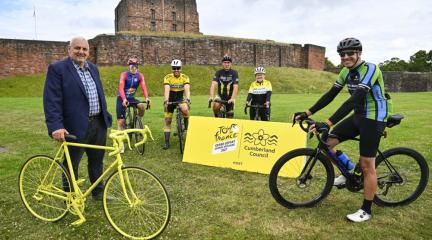 Cyclists Outside of Carlisle Castle