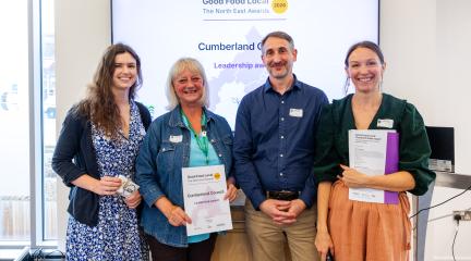 Members of Cumberland Council's Food Cumberland team receive an award from Sustain