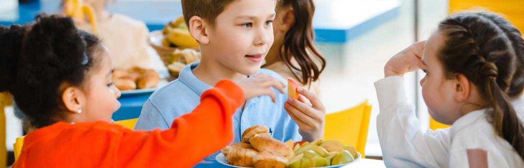 Primary school children eating breakfast