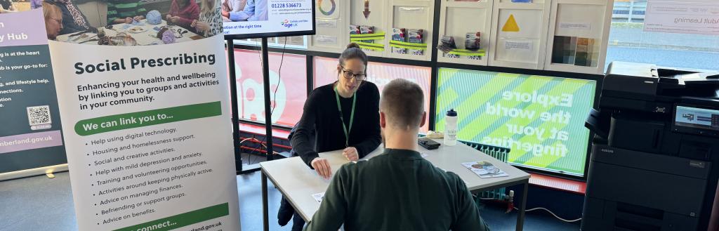 person attending a social prescribing drop in at Workington Library