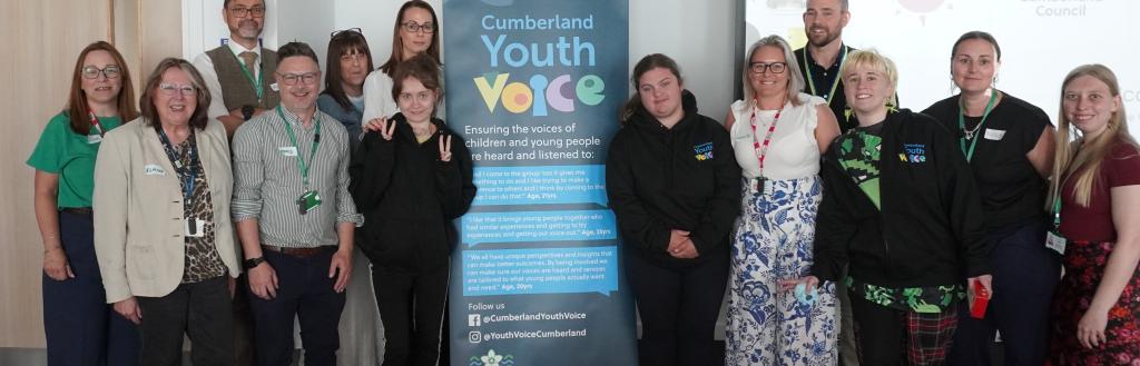 Young people from Unique Voices, along with directors, councilors and officers from Cumberland Council.