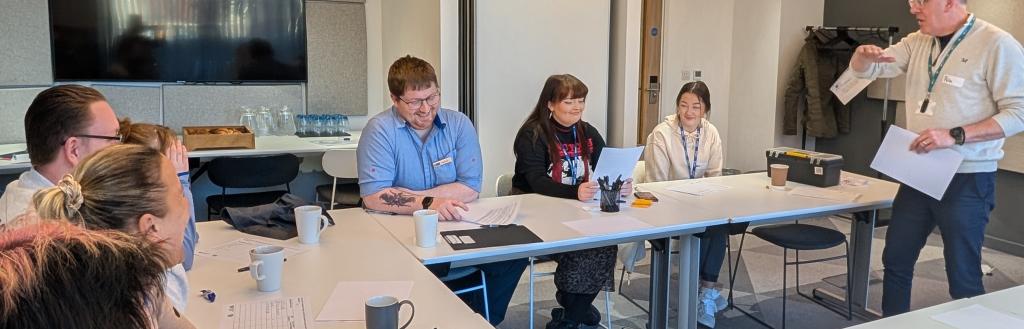 People in an adult learning class