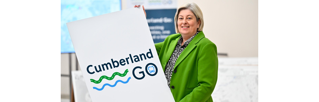 Denise Rollo with Cumberland Go poster