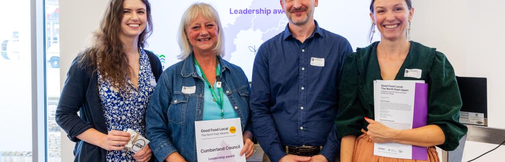 Members of Cumberland Council's Food Cumberland team receive an award from Sustain
